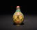 A CLOISONNE- ENAMEL GILT-BRONZE SNUFF BOTTLE