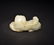 A CARVED WHITE JADE BEAST - 4