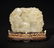 A CARVED WHITE JADE BOULDER