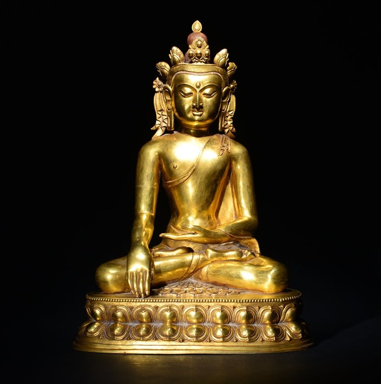 A GILT-BRONZE FIGURE OF BUDDHA (1 of 7)