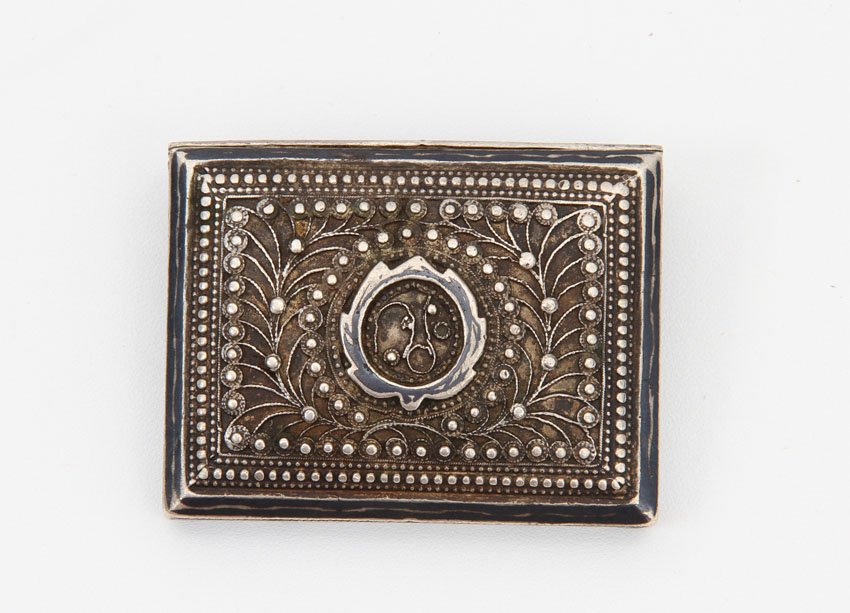 CAUCASIAN SILVER BUCKLE: Caucasian silver buckle decorated with filigree work. 19th century