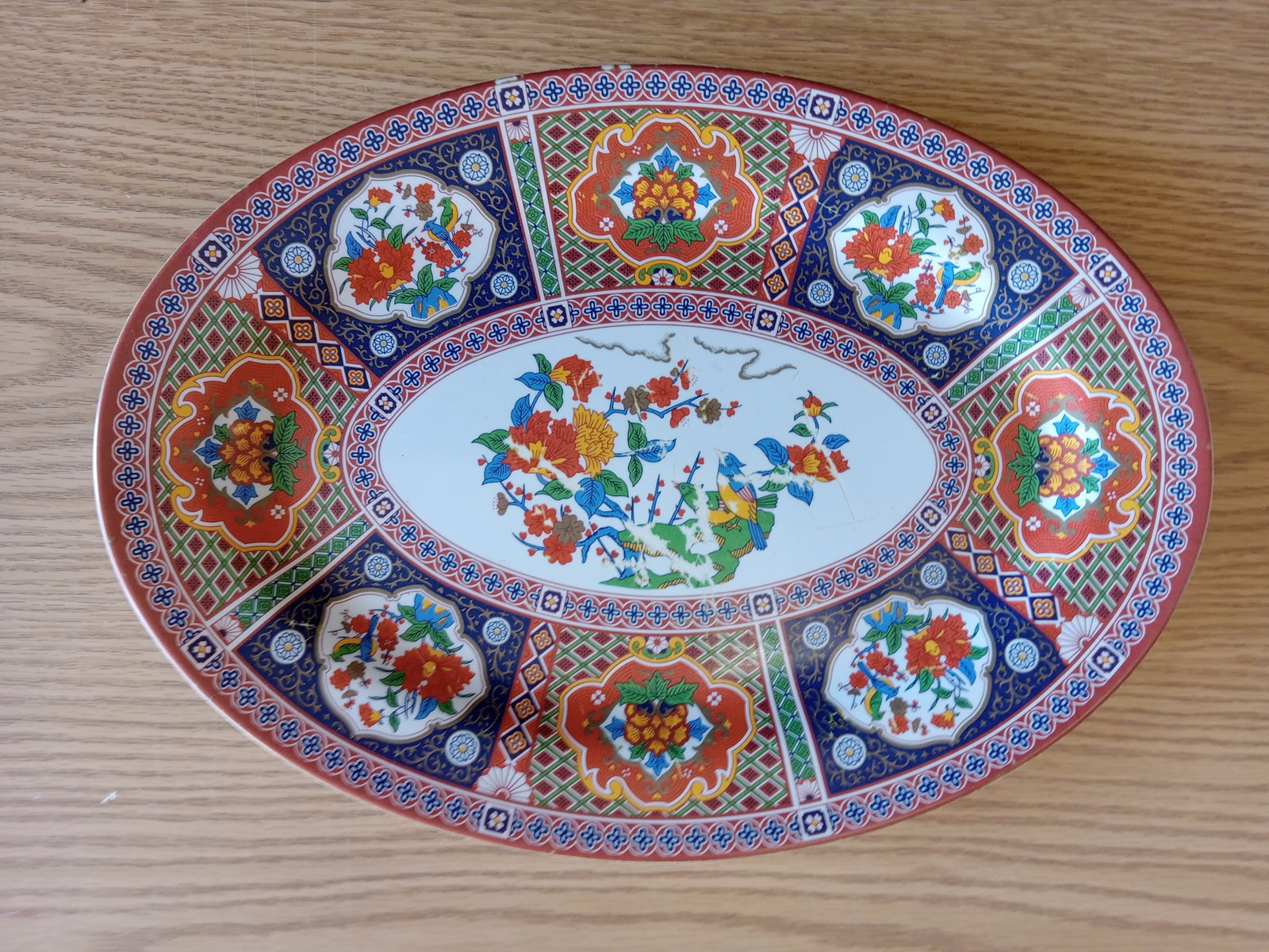 Serving Plate-Asian: Serving Plate-Asian, plastic. These items are part of an estate sale and we are a consignment based Auction House. All auction lots are sold strictly "AS IS." Any condition reports or market estimates
