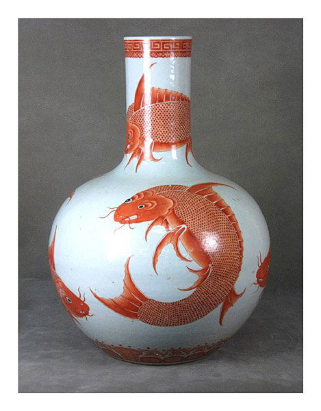 A red glazed globe vase with fishes design, Qing D: A red glazed globe vase with fishes design, Qing Dynasty, H.57.5cm