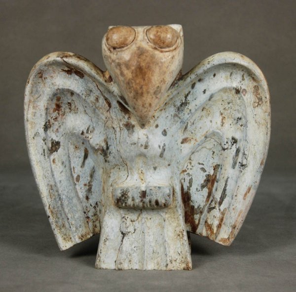 Carved stone eagle of Longshan Culture in period o: Carved stone eagle of Longshan Culture in period of Shang and Zhou Dynasties, H.18cm, Shang and Zhou Dynasties, This tremendous example of a large flying and attacking eagle shows the true genius of t