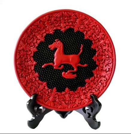 A lacquer carved plate with design of horse