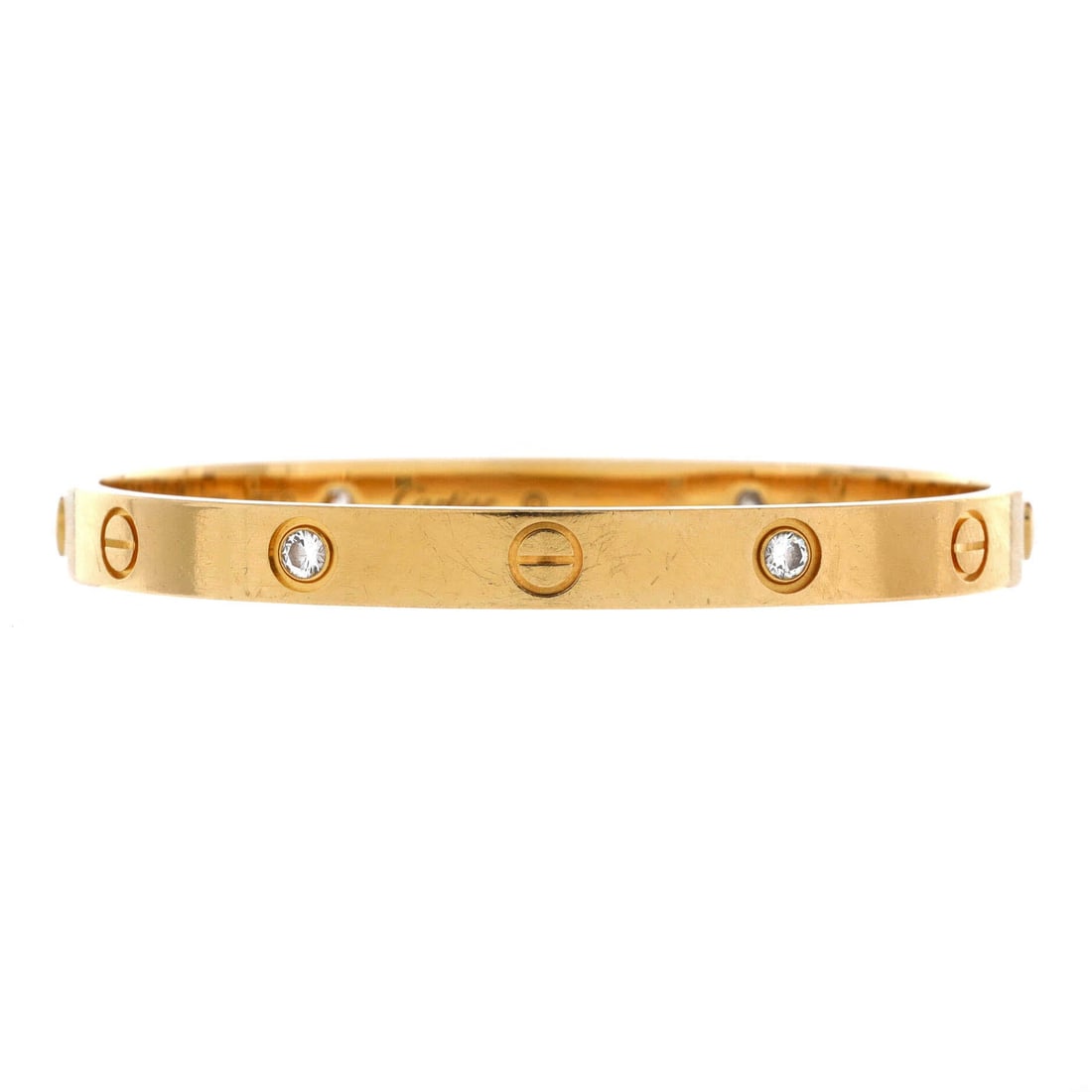 Cartier 18K Yellow Gold with Diamonds Love 4 Diamond Bracelet Size 17 COA: Cartier Love 4 Diamond Bracelet. Material: 18K Yellow Gold with Diamonds. Approx. Cartier bracelet size 17 (based on measured inner circumference). Measurements: Circumference: 6.25 "; Width: 6.00 mm.