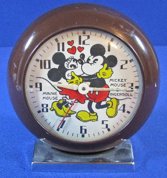 INGERSOLL MICKEY MOUSE CLOCK BY AL HOREN: Designed and made by Al Horen in the 1960s, usually found as a pocket watch. Rare to find as a clock. In chrome and painted tin case, runs but needs cleaning (no guarantee of run time or accuracy). Mi