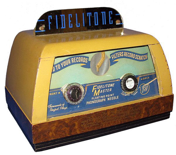 STORE DISPLAY CASE FOR FIDELITONE NEEDLES AND CARTR: Art Deco wood case with original marquee made by Marvin Farrell & Company ? (hard to read) Both drawers are full off needles and cartridges in various styles from various makers. There is some light p