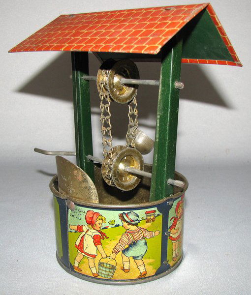 JACK AND JILL TIN LITHO TOY WELL: C-1915 tin litho toy by Kiddie Metal Toys Inc. features four scenes of Jack & Jill at the infamous hill. Has only a couple of minor scratches Size: 6 3/4" tall, 5" wide