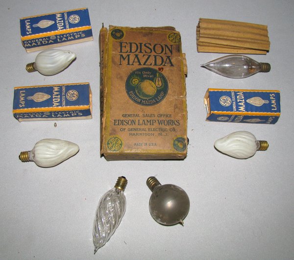 TEN MISC. SMALL ANTIQUE LIGHT BULBS: Includes five Edison Mazda candle flame bulbs in original box. Box is poor. Three G.E Mazda painted fame bulbs in sleeves and two others. Untested but filaments are intact, sizes vary. Size: Sizes Var