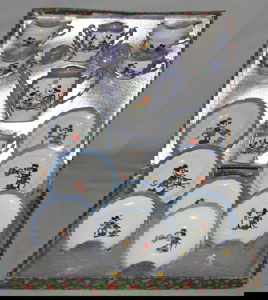 BOXED MICKEY MOUSE LUSTREWARE TEA SET: Set is complete. No chips cracks or damage. Slight typical discoloration to blue trim. Original box has some edge wear. One inch section missing from side skirt on lid. Box grades VG. Size: 11" x 9 1/