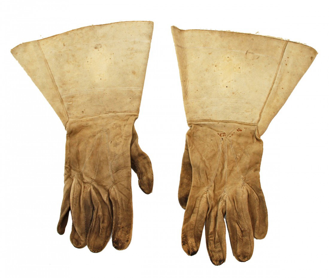 CIVIL WAR GAUNTLETS WITH CONFEDERATE PROVENANCE: Has original hand signed label inside one cuff, from J.S. Cook, kid leather gloves show soiling and use wear, both cuffs have evidence of an applied and later removed emblem, comes with information on