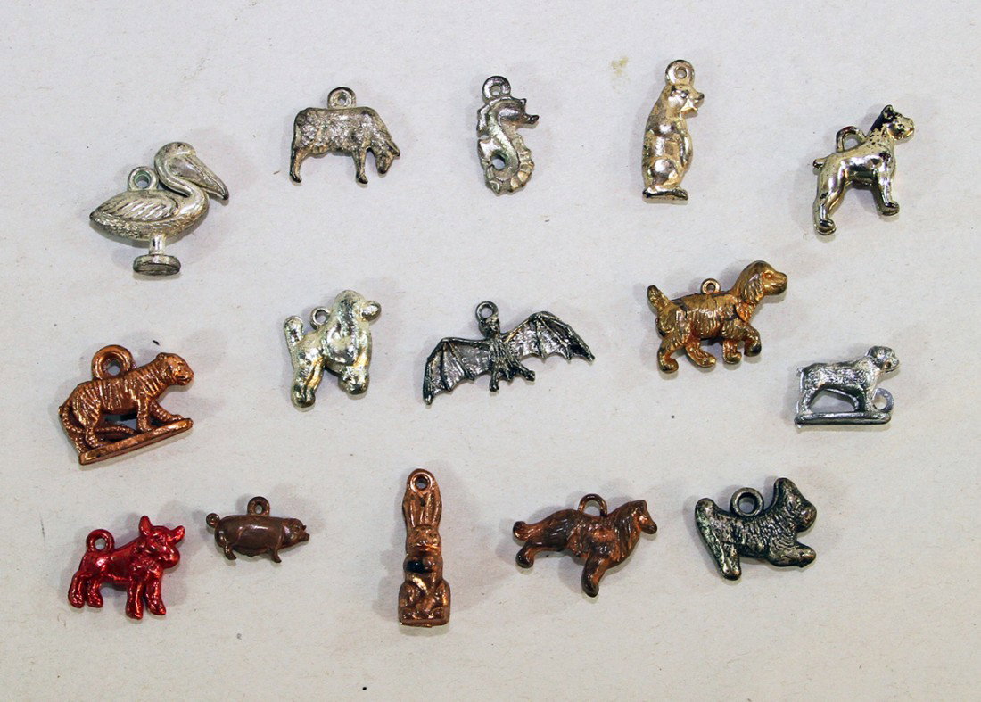 15 METAL ANIMAL CRACKER JACK CHARMS: There are dogs, pig, seahorse, bat, pelican, tiger, etc.