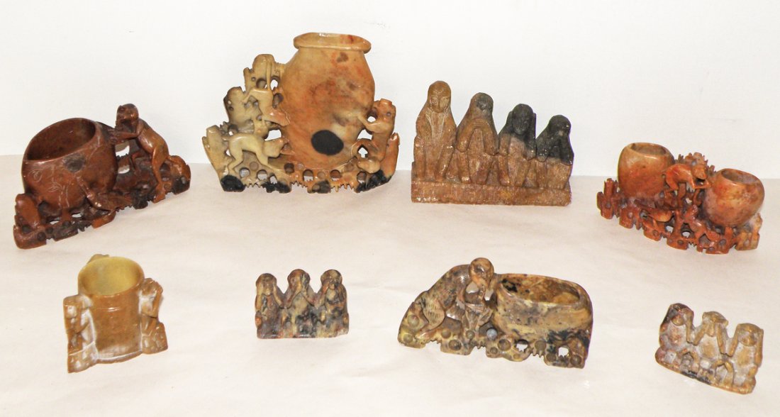 EIGHT PIECES OF CARVED SOAPSTONE WITH MONKEYS: All pieces have images of one or more monkeys. The lot also Including a beaver, dog and plants. See no, speak no, hear no and have no fun figure has chip to base. Size: Largest: 6"