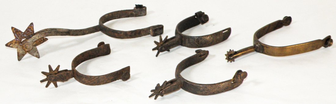 FIVE 19TH CENTURY SPURS: Texas and Mexican spurs. Brass and iron. Size: Varies