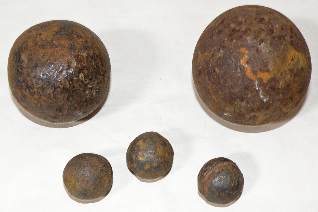 PRE-CIVIL WAR ERA CANNON BALLS AND SHOT: Five pieces, two cannon balls and three pieces of shot. Dug from Texas battlefields, either from the Texas War of Independents or the Mexican American War. Size: LargestL 3" diam
