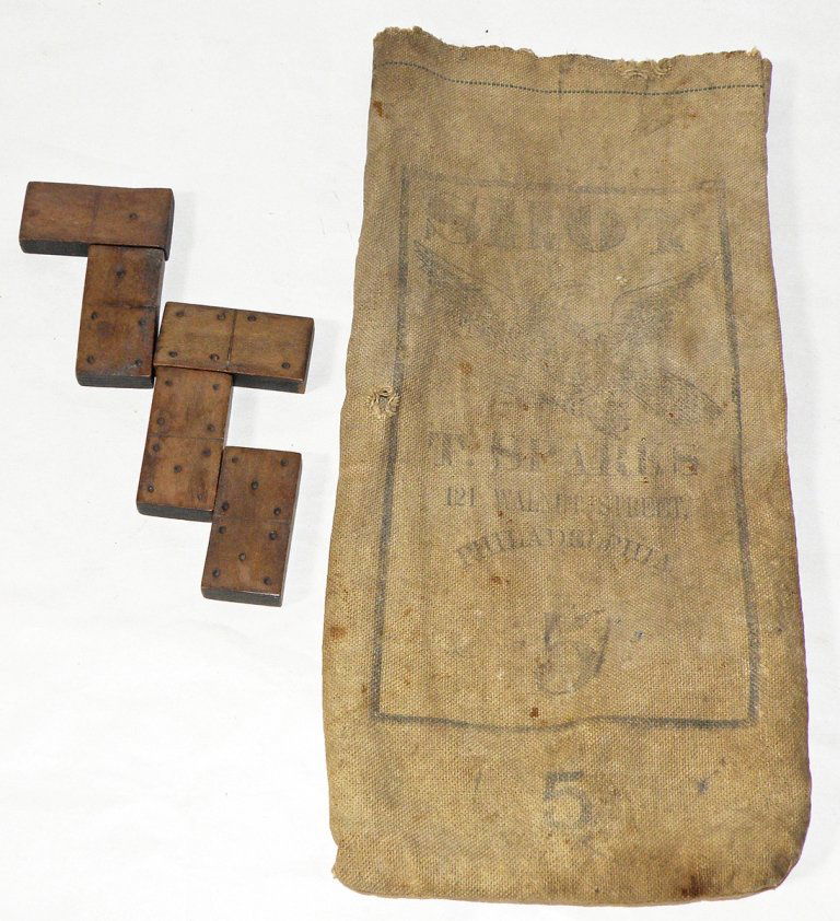 SET OF HAND CARVED CIVIL WAR ERA DOMINOES: Wood Dominoes are in a T. Sparks no. 5 shot bag, bag has hand painted name; Joseph Durn, Penn. State Cavalry, 3rd. Regiment. Dominoes show minor wear and bag has some wear and fading. Size: Varies