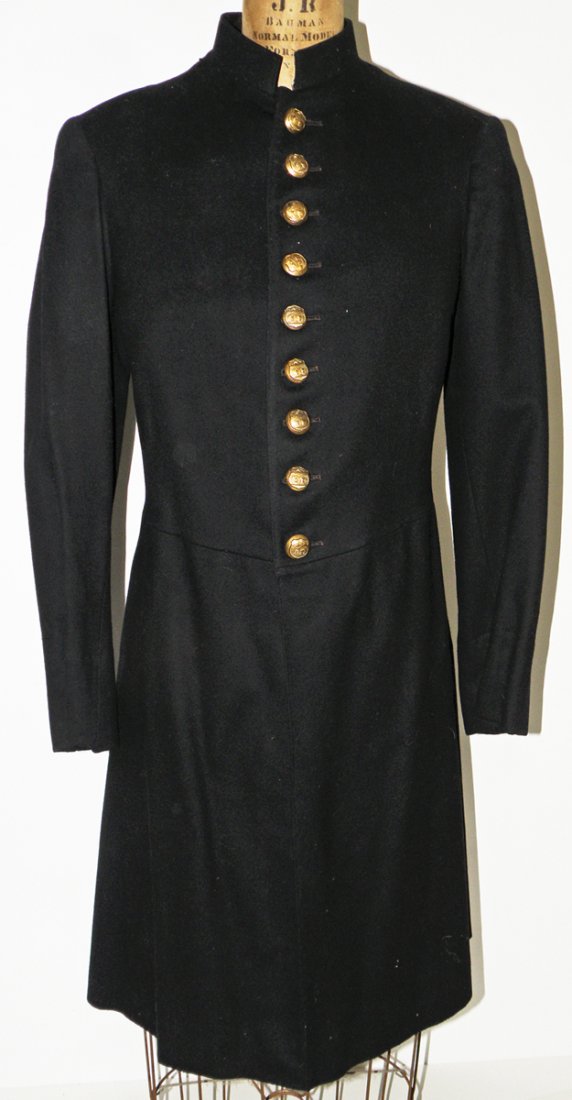 19TH CENTURY U.S. OHIO OFFICERS FROCK COAT: Indian Wars period. Identified to be Norris J. Waltons Elyria, Ohio. Buttons back-marked M.C. Lilley, Colombus, OH. Nine Ohio coat buttons, six cuff buttons and four tail buttons. Silk lining with N.J