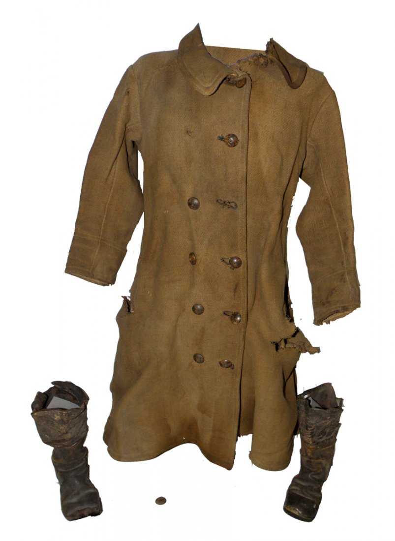 CONFEDERATE CHILD'S FROCK COAT AND BOOTS: Family history from seller had this coat belonging to an ancestor who was a Drummer Boy (Note wear at strap location on shoulder). The coat has wood buttons on two outside pockets. Coat is made of coa