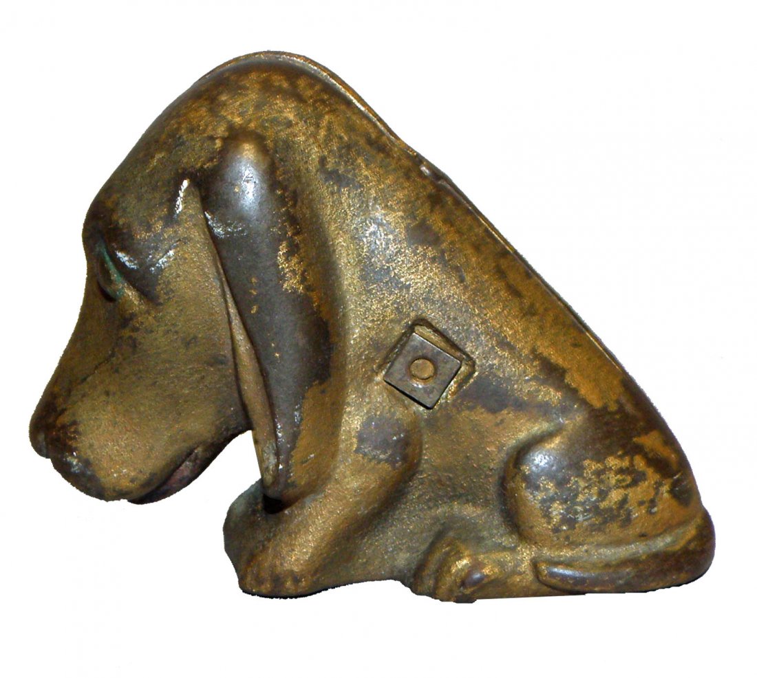 RARE BASSET HOUND STILL BANK: Cast iron bank made in the US possibly by A C Williams. Some wear to original finish. Ref. "Moore's Penny Bank Book" No. 380, rarity E Size: 4-1/4" long, 3" tall