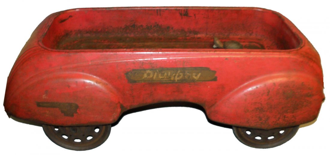 ART DECO PLAYBOY WAGON: Rare streamline "Playboy" wagon. Dual headlamp version. Missing pull handle and lamps. Overall wear to original surface. Metal fatigue to rear axle mount inside bed. Size: 45" long