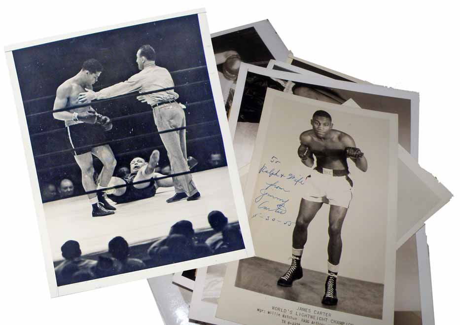 TWENTY 1950S BOXING PHOTOS: Mostly press release photos from A.P., etc. Also includes two signed photos from Bobo Olson and James Carter. Size: Largest 8" x 10"