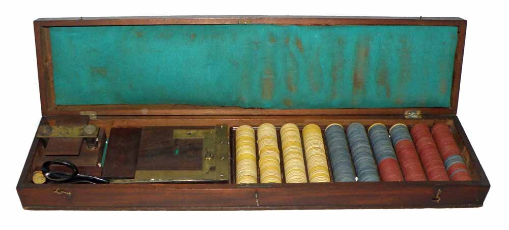 CASED 19TH CENTURY GAMBLER'S SET: Includes card press and card trimmer. No signature found, but probably by Will & Finck. Also has original ivorine poker chips. Comes in fitted mahogany case with original key. Case lid has some age sp