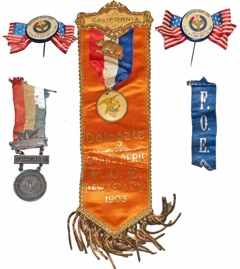 FIVE NYC F.O.E PIECES: For the 1903 Convention. Includes California delegate ribbon, two officials badges, a medal, and a ribbon. Size: Largest 10" long