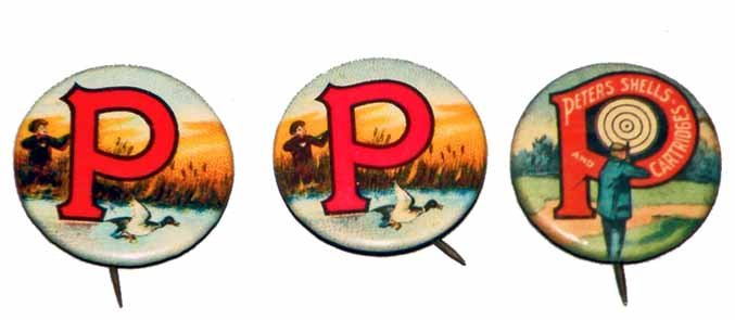 THREE PETERS AMMO PINBACKS: Celluloid over tin. Earliest one includes paper insert. Very minor surface wear. Size: 7/8" diameter
