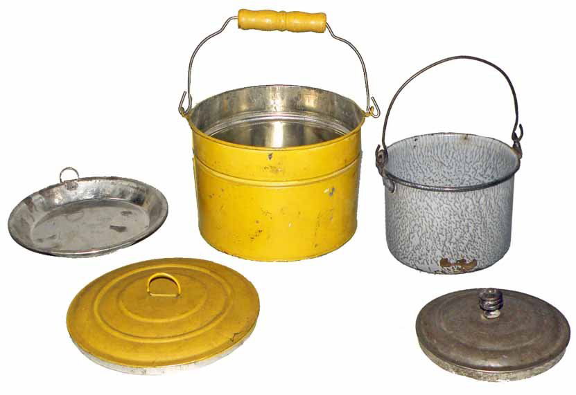 TWO LUNCH BUCKETS: One is granite ware with some chipping (original lid). The other is yellow painted tin with original tray and lid. Size: Largest 5" tall, 6" diameter