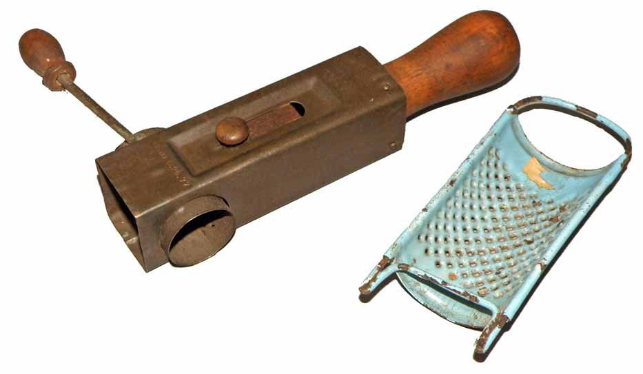 TWO NUTMEG GRATERS: One is granite wear (some chipping), and the other is tin and wood mechanical grater (patented December 25, 1877. Wood handle has chip but is complete). Size: Largest 6 1/4" long