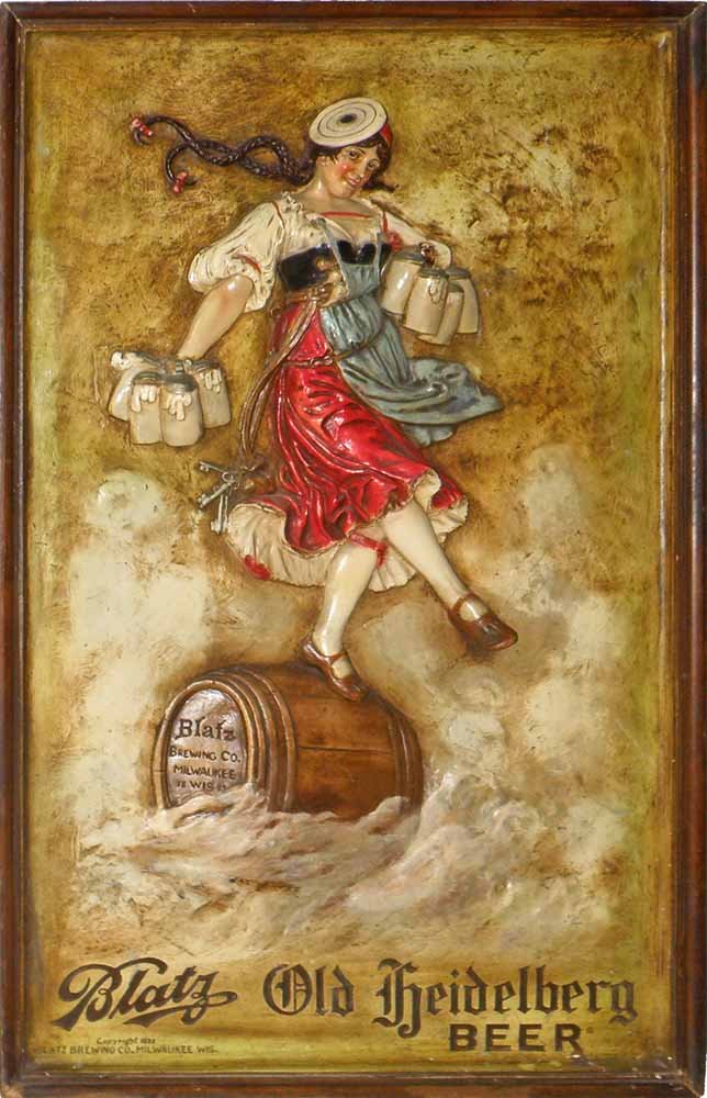 1933 DIMENSIONAL BLATZ BEER SIGN: Relief sign of a pretty barmaid. In original frame, sign made of horsehair reinforced plaster. Appears to have some inpainting at bottom of barrel, and some typical crazing to surface. 36" tall x 22"