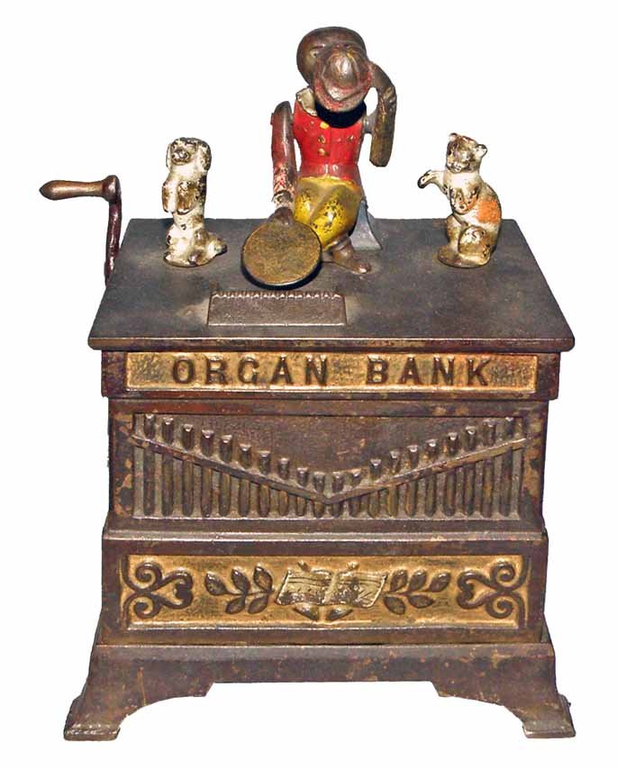 ORGAN MECHANICAL BANK: Dog and cat version. Made Keyser & Rex. Patented June 13, 1882. Works fine with music intact. Scattered light paint wear and chipping. 5 3/8" x 4" (base)