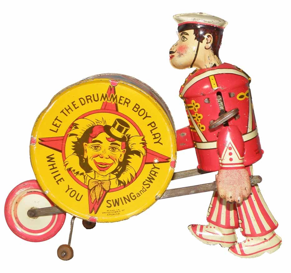 MARX WINDUP DRUMMER BOY: Tin windup toy works fine. Has light play wear and light litho loss to both hands. 7 3/4" tall x 8 1/2" long