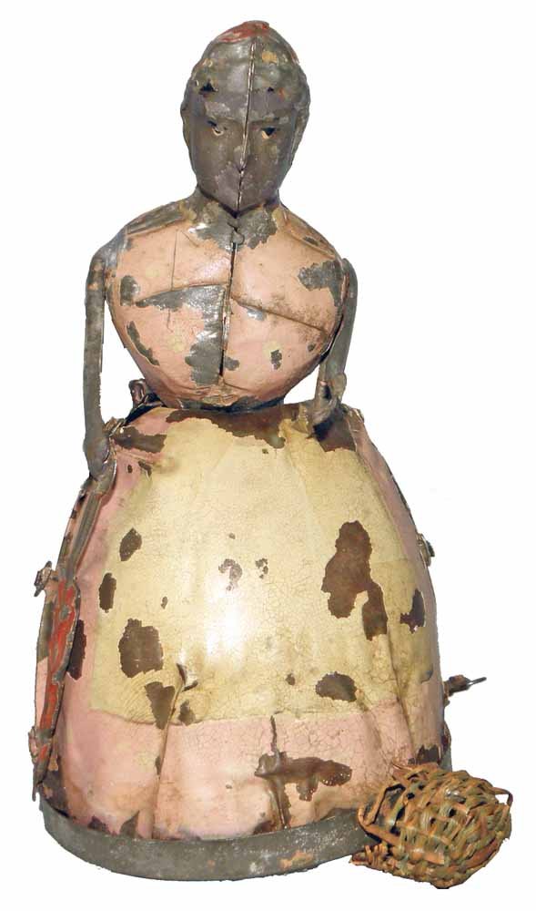 GUNTHERMANN AUNT JEMIMA: Hand painted tin windup with remnants of original wicker basket. Overall paint chipping. Toy works fine. 6 1/2" tall