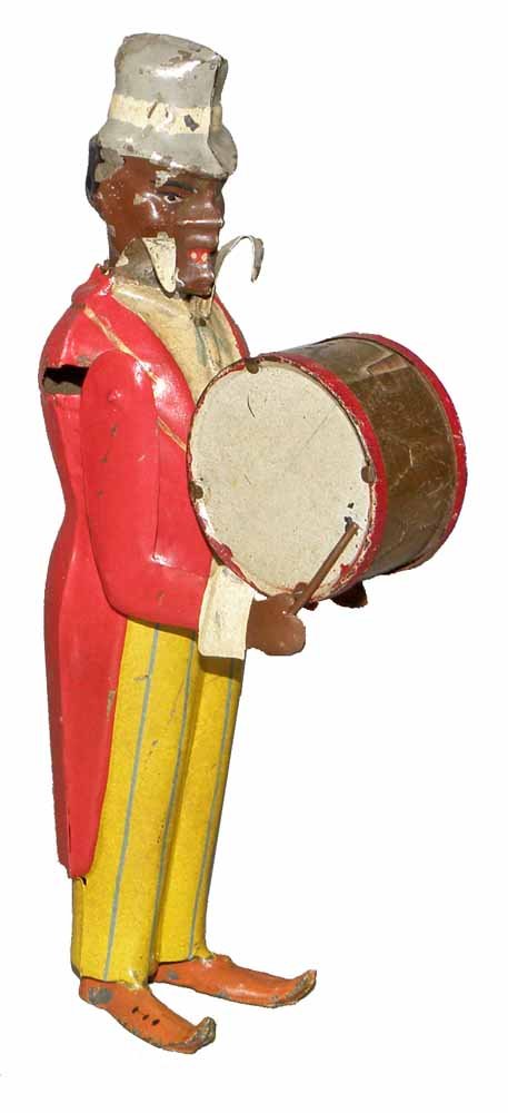 HAND PAINTED TIN BLACK DRUMMER: German tin windup toy works fine. Painted clothing has been professionally restored. 8" tall
