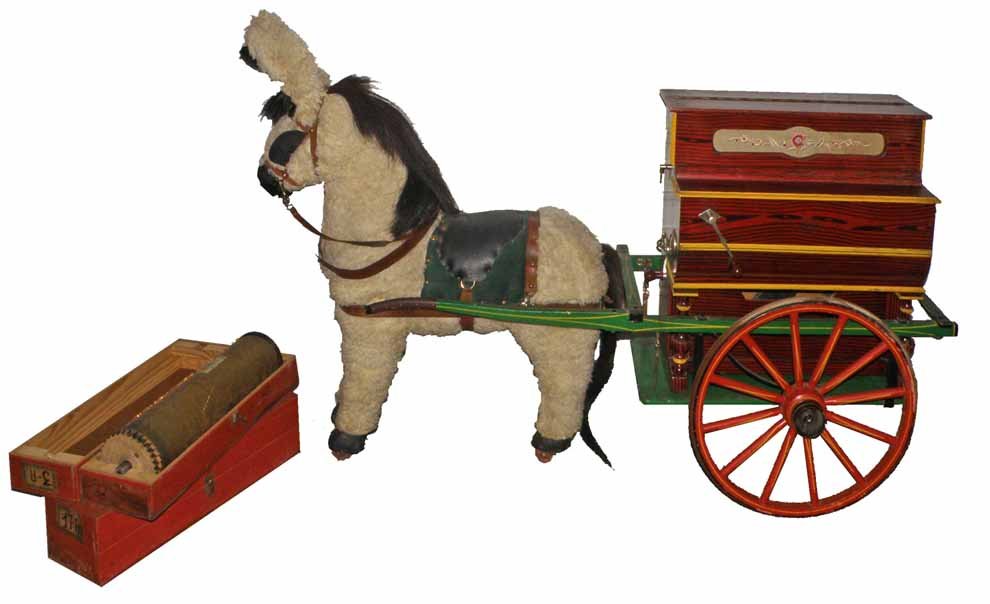 BAND ORGAN ON CART WITH DONKEY: Nicely made 1960's band organ by Faventia, Barcelona Spain. Complete organ is opereated by hand crank or working electric motor. Has three original cylinders. Organ is mounted in original wood cart an