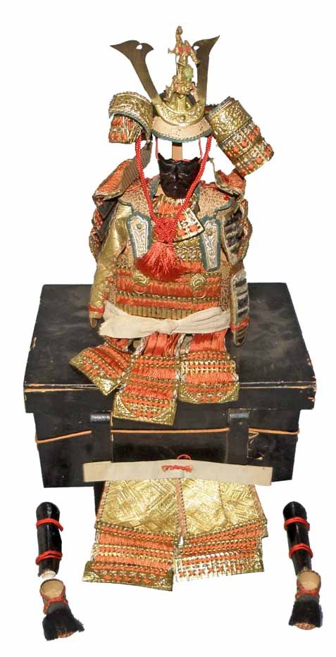 BOXED JAPANESE SAMURAI OUTFIT: Complete miniauture outfit with some minor aging. Original wood box is missing two legs. Box is Fair-Good. 11.5" tall