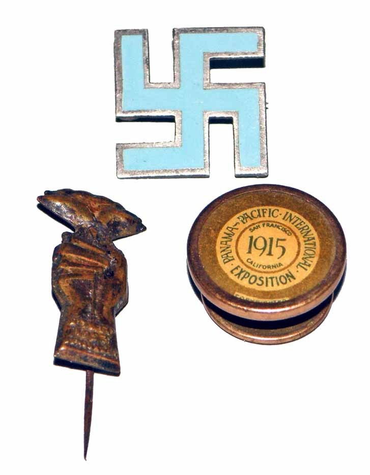 THREE PIECES OF JEWELRY: A southwestern sterling and blue enamel swastika, a 1915 Pan Pacific Expo collar button and a 1953 stamped brass lapel pin from Jerusalem. Varies