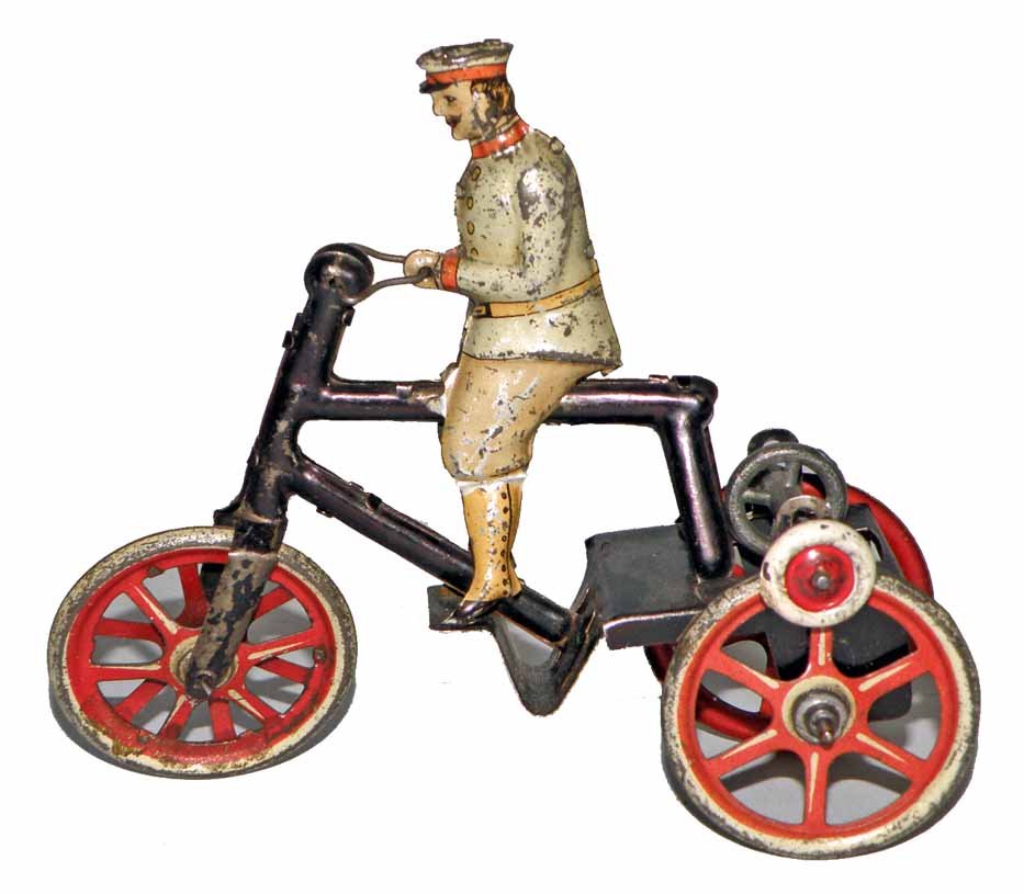 GUNTHERMANN FRICTION MOTORIZED TRIKE: Early gyro action toy. Wear to litho. 5" long, 4-1/2" tall