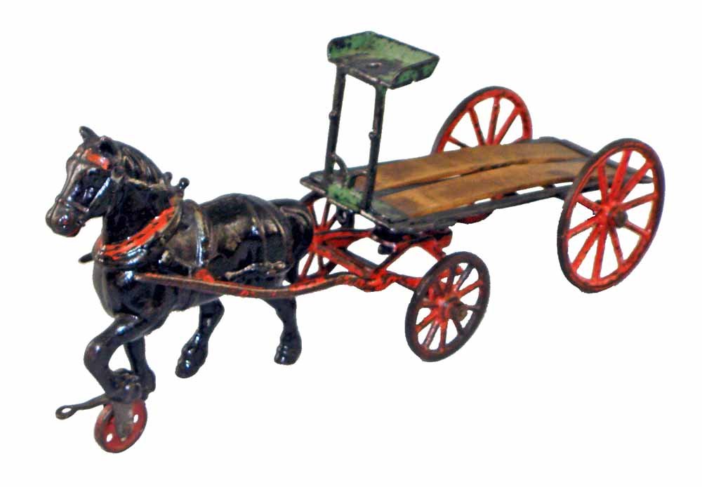 PRATT & LETCHWORTH DRAY: Cast iron cart, missing side rails. Original wood inserts, one repaired. Scattered paint wear. 13-3/4" long