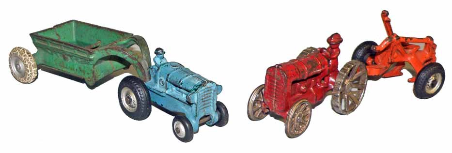FOUR CAST IRON FARM TOYS: An Arcade tractor with earth mover and an Arcade tractor with plow. Scattered paint chipping. Largest is 8-1/2" long