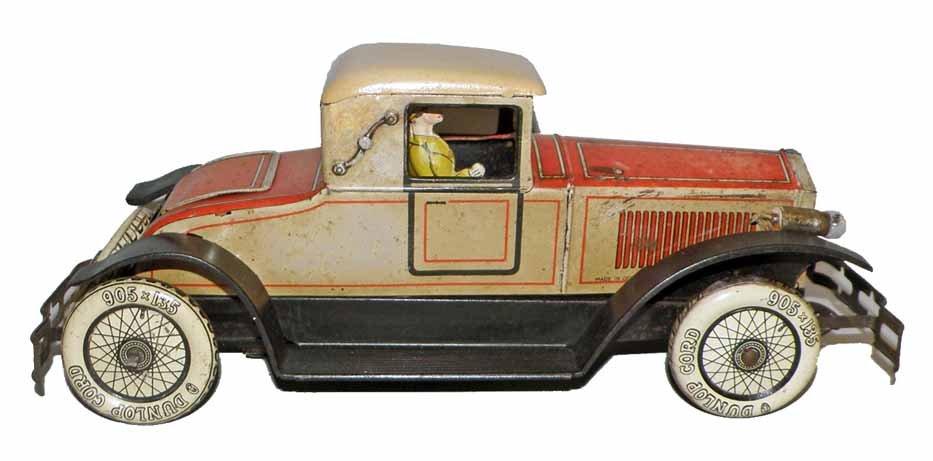 TIPP RUMBLE SEAT COUPE: Electric headlight version retains original female driver. Motor is working. Lift up rumble seat. Wear and spotting to litho. 12-1/2" long