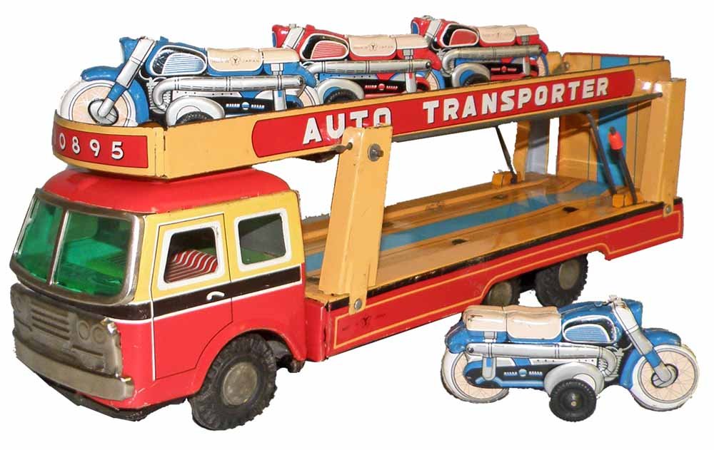 YONEZEWA AUTO TRANSPORT TRUCK: Retains four original motorcycles. Light scratching and some spotting to bottom carrier bed. Bikes are 4 inches long. 14" long