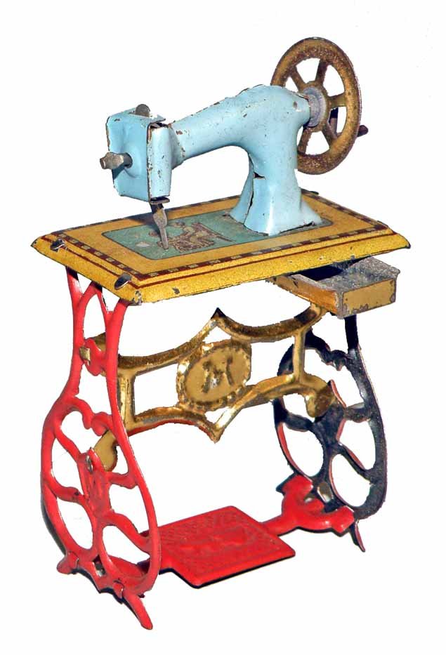PENNY TOY SEWING MACHINE BY MEIER: Retains original candy drawer. Minor surface wear. 3-1/4" tall