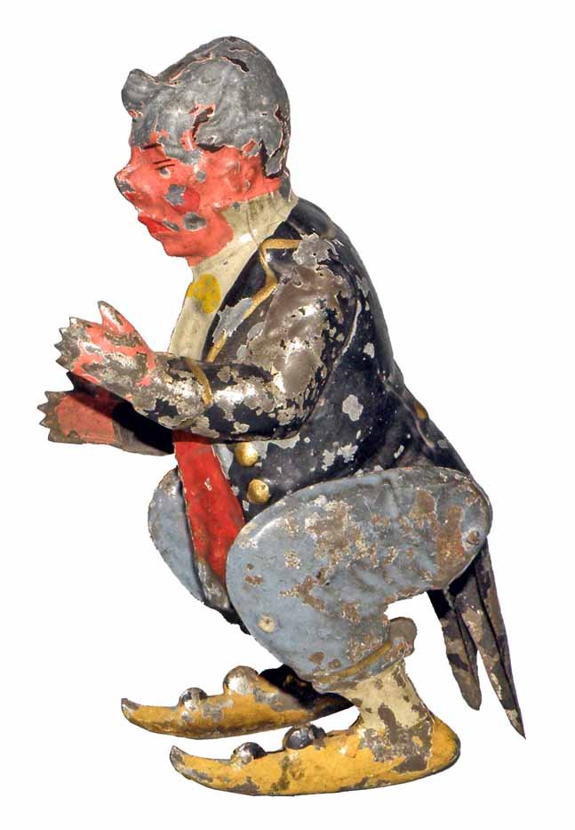 HAND PAINTED GERMAN WIND-UP HOPPING DUDE: Well dressed figure has scattered chipping to original paint. Mechanism works, could use oiling. 6" tall