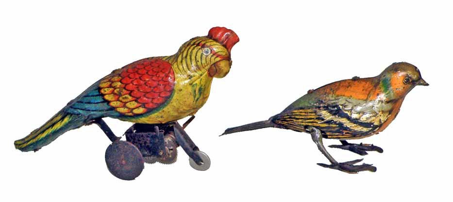 TWO GERMAN TIN WIND-UP BIRDS: Eberl Robin and an unmarked parrot. Both work fine with surface wear and spotting. Largest is 9" long