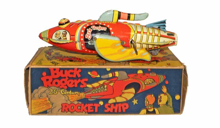 BOXED BUCK ROGERS 25th CENTURY ROCKET SHIP: Lithographed tin wind-up by Marx works fine. Retains original tail fin, toy has scattered scratching and play wear. Original box is missing inner flap from one end, box has some tears and light creasi