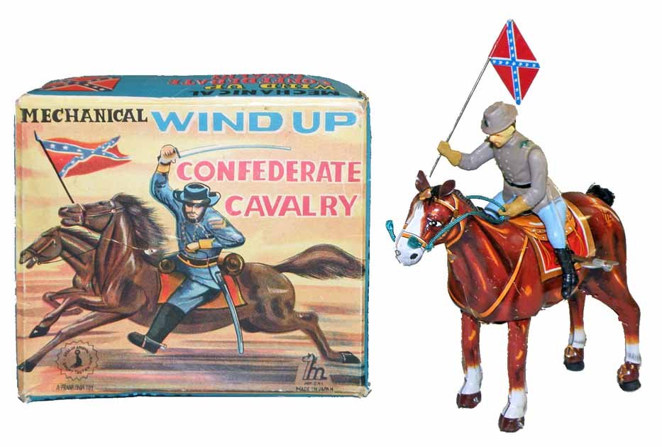 BOXED WIND-UP CONFEDERATE CAVALRY: Working tin and vinyl toy retains original flag. Made by Mikuni, distributed by Frankonia. Original box has some creasing and punctures to lid and grades good to very good. Toy has some minor scratchi