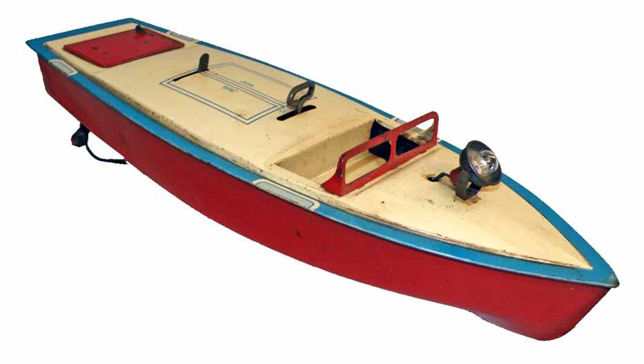 CLOCKWORK TIN BOAT: Unknown maker, probably American. Works fine with battery operated spot light to bow. Some surface wear and scratching. 17-3/4" long
